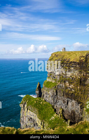 O'Brien's Tower on top of the Cliffs of Moher in County Clare, Ireland on a sunny day Stock Photo