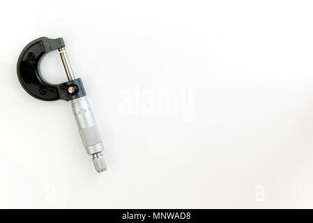 Micrometer screw gauge isolated on a white background. Measuring device precision Stock Photo