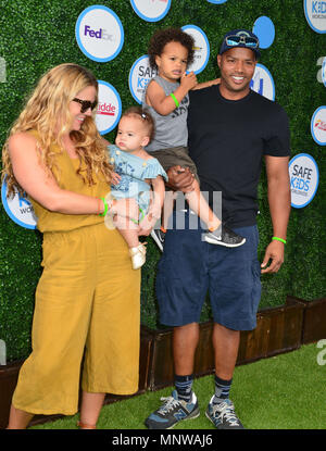 Donald Faison, wife Cacee Cobb + kids   at the Safe Kids Day at Smashbox Studios on April 24, 2016 in Culver City, California.Donald Faison, wife Cacee Cobb + kids  ------------- Red Carpet Event, Vertical, USA, Film Industry, Celebrities,  Photography, Bestof, Arts Culture and Entertainment, Topix Celebrities fashion /  Vertical, Best of, Event in Hollywood Life - California,  Red Carpet and backstage, USA, Film Industry, Celebrities,  movie celebrities, TV celebrities, Music celebrities, Photography, Bestof, Arts Culture and Entertainment,  Topix, vertical,  family from from the year , 2016, Stock Photo