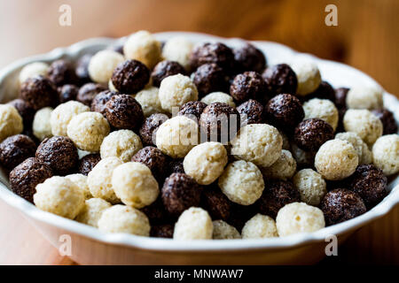 Chocolate Cereal balls in bowl. Breakfast Concept. Stock Photo
