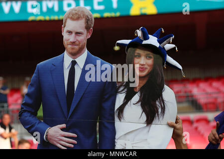 London, UK, 19 May 2018.  Chelsea fans hold a cardboard cutout of Prince Harry and Meghan Markle before the FA Cup Final match between Chelsea and Manchester United at Wembley Stadium on May 19th 2018 in London, England. (Photo by Paul Chesterton/phcimages.com) Credit: PHC Images/Alamy Live News Stock Photo