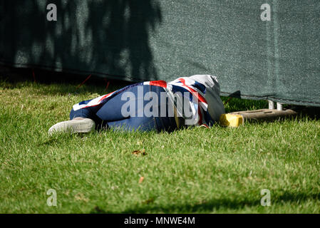 Royal Wedding of Prince Harry and Meghan Markle at Windsor. A member of the public relaxes after the long wait in Windsor Great Park for the procession Stock Photo