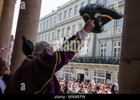 Windsor, UK. 19th May, 2018. Chris Brown, Official Town Crier of the Royal Borough of Windsor and Maidenhead, proclaims the wedding of Prince Harry and Meghan Markle at the Guildhall prior to the carriage procession. Credit: Mark Kerrison/Alamy Live News Stock Photo