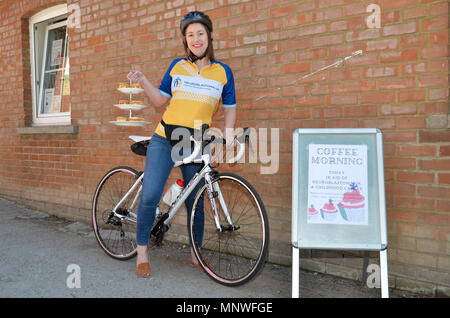 Swindon, UK. 19th May 2018. Alice Douglass from Highworth is cycling from London to Paris in August, raising money for Neuroblastoma UK. On 19 May she kicked off her fundraising campaign with a coffee morning at the Highworth Town Council Community Room. Credit: Anne Rogers/Alamy Live News Stock Photo