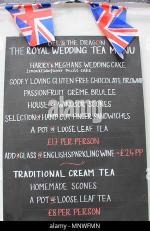 11 May 2018, UK, London: A panel offers a tea menu, serving a piece of Prince Harry's and Meghan Markle's wedding cake. Photo: Silvia Kusidlo/dpa Stock Photo