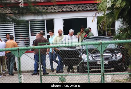 Havana, Cuba. 19th May 2018.  Cuban President Miguel Diaz-Canel steps into his offical car after meeting physicians at the institute for forensice medicine. 24 hours after a plane crash in Havana, the reasons for the crash are still unclear. It is unlikely that other passengers had survived the crash apart from three severely injured passengers. The aircraft had been in service for almost 40 years. Photo: Guillermo Nova/dpa Credit: dpa picture alliance/Alamy Live News Credit: dpa picture alliance/Alamy Live News Stock Photo