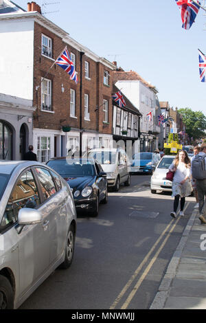 Eton, UK. 19th May 2018. Eton High Street gridlocked with queues of taxis to collect visitors after Royal Wedding at Windsor Castle. Credit: Karen Hunt/Alamy Live News Stock Photo