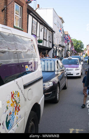 Eton, UK. 19th May 2018. Eton High Street gridlocked with queues of taxis to collect visitors after Royal Wedding at Windsor Castle. Credit: Karen Hunt/Alamy Live News Stock Photo