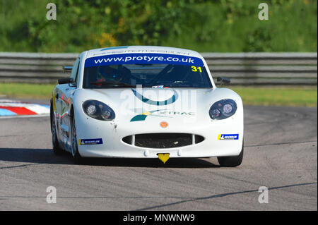 Charlie Digby (HHC Motorsport) racing at Thruxton Race Circuit during classification for the Protyre Motor Sport Ginetta GT5 Challenge, Andover, Hampshire, United Kingdom.  With the highest average speed of any track visited by the BTCC, Thruxton’s 2.4 mile circuit provides some of the biggest thrills and spills in motor sport and has earned a reputation of being a true driver's track.  In 1993, Damon Hill drove a Williams Formula One car around the circuit at an average speed of 147mph and drivers can reach 186mph. Stock Photo