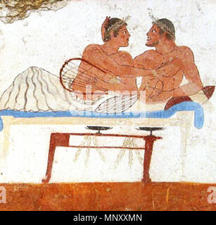 . An eromenos with his erastes involved in a pederastyc love scene from a symposium. It's a detail from the frescoes belonging to the north wall of the Tomb of the Diver in Paestum, now at the local National Museum. The frescoes are painted in true fresco on limestone slabs and are dated about 475-470 BC . 31 March 2005. Original uploader was en:User:Apollomelos at en.wikipedia 1199 Tomb of the Diver symposium Stock Photo