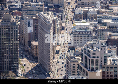 Flatiron building between the cross of the Brodway and 5th Avenue. Manhattan, New York City, USA. May 1st, 2018. Stock Photo