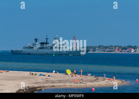 Relaxing on a hot summer day at the beach 'Falkensteiner Strand', the frigate 'Bayern' and the marine monument Laboe, Kiel Fjord, Kiel, Germany, Stock Photo