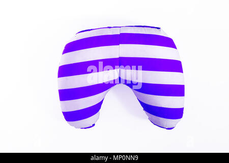 colored striped road travel pillow isolated on white background. Stock Photo