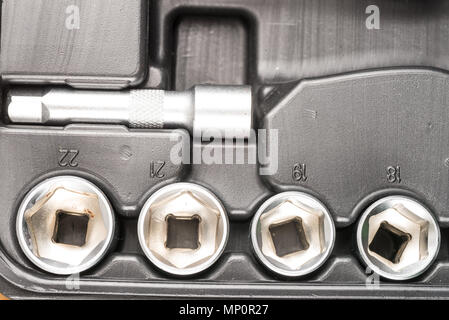 Assorted ratchet sockets inside a toolbox Stock Photo