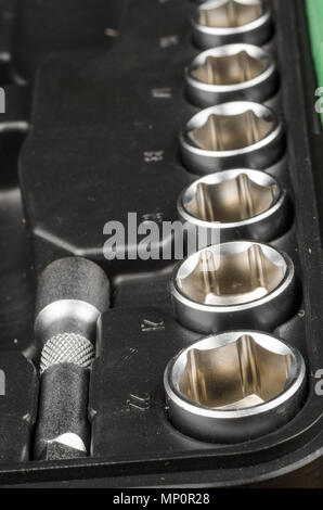 Assorted ratchet sockets inside a toolbox Stock Photo