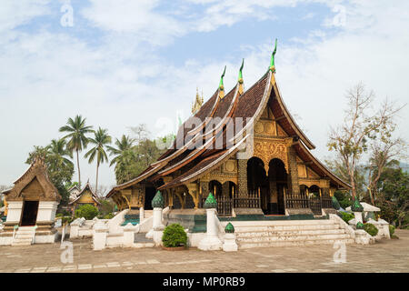 View of the Buddhist Wat Xieng Thong temple ('Temple of the Golden City') in Luang Prabang, Laos. Stock Photo