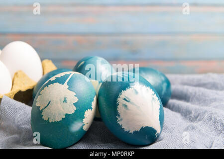 Happy easter, organic blue easter eggs, easter holiday decorations, easter concept backgrounds with copy space Stock Photo