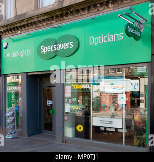 Frontage and entrance to a branch of Specsavers opticians and audiologists in Hamilton, South Lanarkshire, Scotland, UK Stock Photo