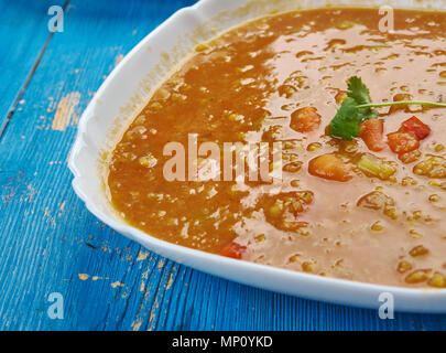 Persian Lentil Soup, Dried limes, or black limes, provide a complex flavor to many Iranian dishes Stock Photo