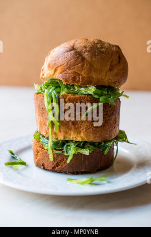 Seaweed Salad Sandwich with Panettone Bread. FastFood. Stock Photo