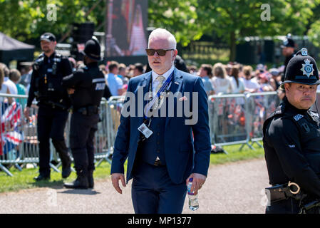 19 May 2018 - Armed police, security, and other protection officers patrol the Long Walk during the royal wedding in Windsor Castle of Prince Harry and Meghan Markle.