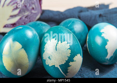 organic blue easter eggs standing on the wooden table, easter holiday decorations, easter concept backgrounds with copy space Stock Photo