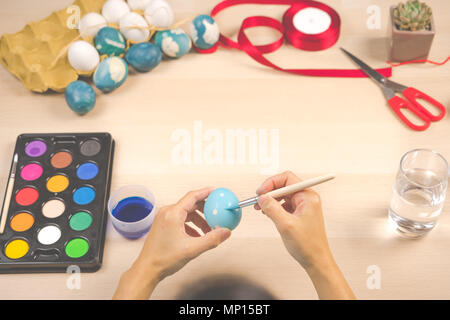 Happy easter, women is painting the easter eggs for easter day festival holiday, easter concept backgrounds with copy space Stock Photo
