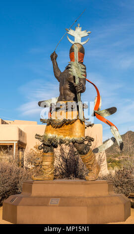 Apache Mountain Spirit Dancer bronze sculpture by Goseyun near the Museum of Indian Arts and Culture in Santa Fe, New Mexico, USA. Stock Photo