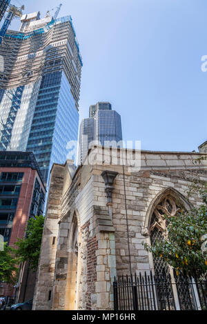 St Helen’s Church, Bishopsgate in the foreground with 22 Bishopsgate under construction and Tower 42 in the City of London Stock Photo