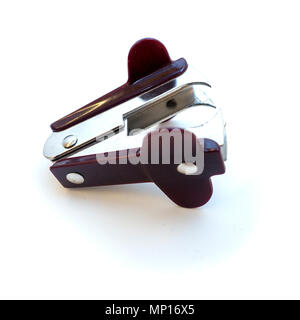 Portable brown silver Office School Staple Remover Stationery Stock Photo