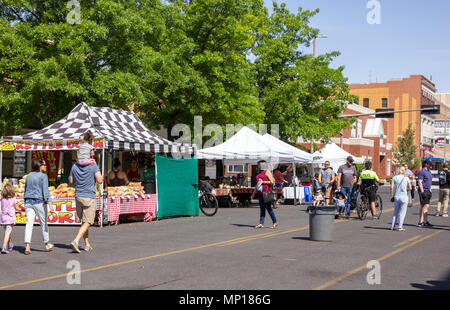 Yakima, Washington / USA - May 21, 2018: People from around the community of Yakima gather on a beautiful day at the downtown farmer's market. Stock Photo