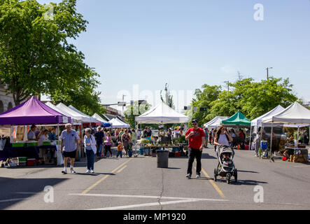 Yakima, Washington / USA - May 21, 2018: People from around the community of Yakima gather on a beautiful day at the downtown farmer's market. Stock Photo