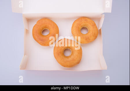donut or donut in box on the background Stock Photo