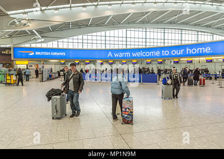 Check in desks at Heathrow Airport Terminal 4 Four London England Stock ...