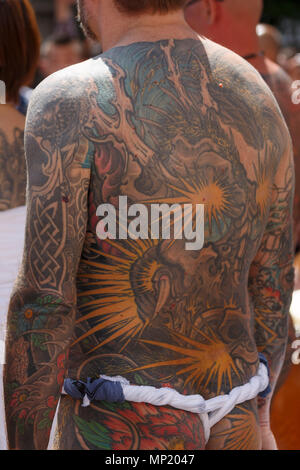 What is the cost of a back body tattoo  Quora