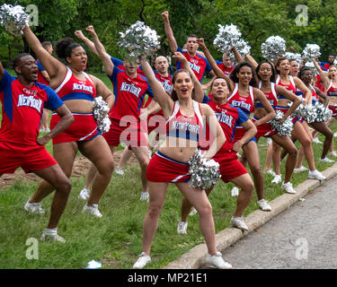 New York, USA. 20 May 2018. Cheer New York members support participants walking through Central Park during the 2018 AIDS walk, a fundraising event in which tens of thousands of people walk or run to raise millions for the Gay Men's Health Crisis and other tri-state AIDS service organizations for this year's AIDS Walk New York. Photo by Enrique Shore Credit: Enrique Shore/Alamy Live News Credit: Enrique Shore/Alamy Live News Stock Photo