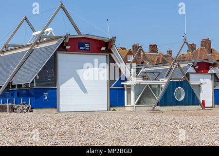 Aldeburgh Lifeboat Station The station’s Mersey class all-weather lifeboat and D class inshore lifeboat stand ready facing the North Sea, Stock Photo