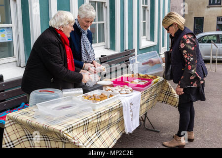 Older women selling homemade cakes at cake stall Cahersiveen County Kerry, Ireland Stock Photo