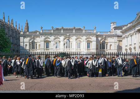 Students graduation UK, undergraduates of Cambridge University line up outside the Senate House before entering it to receive their degrees, England. Stock Photo