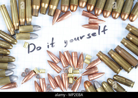 Do It Youself - Reloading cartridges background Stock Photo