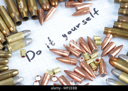 Do It Youself - Reloading cartridges background Stock Photo