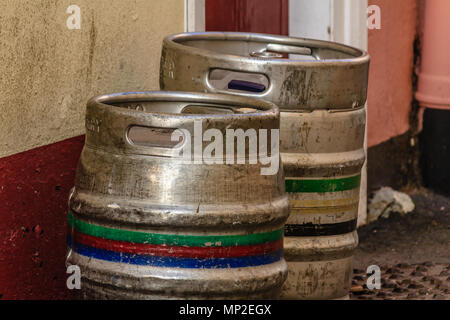 Metal beer cask and keg outside a pub, empty and waiting for collection by brewery. Teignmouth, Devon. Feb 2018. Stock Photo