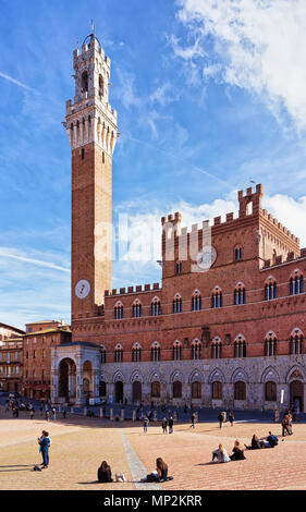 Siena, Italy - October 19, 2016: Tourists in Torre del Magnia Tower Piazza Campo Square Siena, Tuscany, Italy Stock Photo