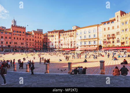 Siena, Italy - October 19, 2016: Tourists on Piazza del Campo Square in Siena, Tuscany, Italy Stock Photo