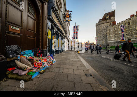Royal Wedding. Homeless rough sleeper on the street early morning in Windsor as people start to arrive for wedding of Megan Markle and Prince Harry Stock Photo