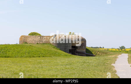 Longues-sur-Mer, Normandy, France, May 15, 2018, Remains of the german Battery which was captured on June 07 1944, Bunker and Artillery Guns Stock Photo