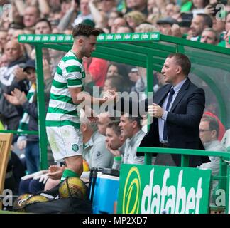 Celtic's Patrick Roberts is greeted by manager Brendan Rodgers as he is substituted during the testimonial match at Celtic Park, Glasgow. Stock Photo