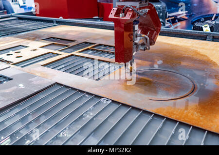 CNC water jet cutting machine modern industrial technology. Stock Photo