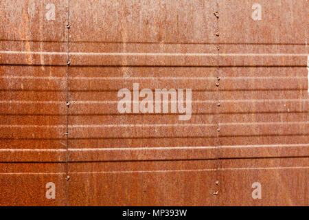 Rusty metal wall background with horizontal lines Stock Photo