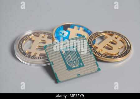 Central processing unit CPU microchip with Bitcoins Stock Photo